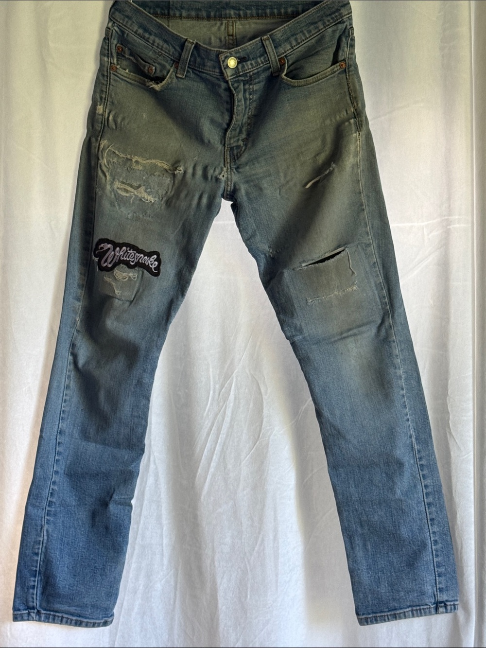 Levi’s 511 Men's Distressed Blue Jeans with Patch Detail